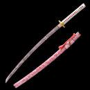 Handcrafted Japanese katana with a red blade and a sleek red scabbard for collectors