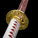 Red-bladed handmade Japanese katana with a complementary red scabbard