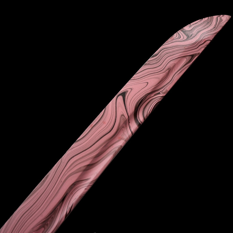 Unique Japanese katana sword featuring a red blade and matching red scabbard, handmade with care