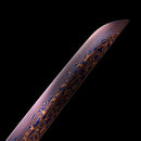 Unique handmade katana sword featuring a red folded Damascus steel blade, ideal for samurai sword lovers.