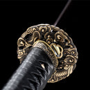 High-quality folded Damascus steel katana featuring a bold red blade.