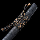 Handmade folded Damascus steel katana with a vibrant red blade for a unique look