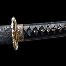 Beautifully crafted katana featuring a red blade made from folded Damascus steel