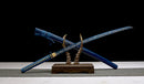 Handmade 1045 Katana Samurai sword with a striking blue pattern on the blade