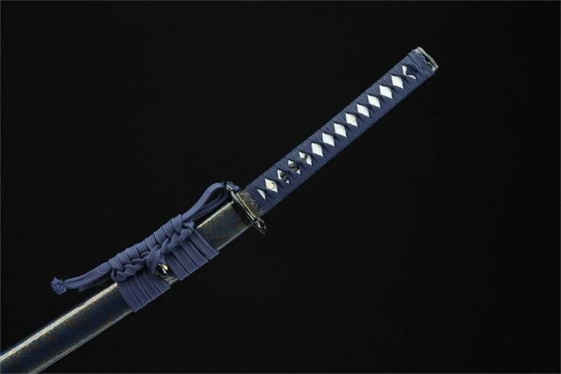 Handcrafted Damascus steel katana sword with a stunning blue special edge for collectors
